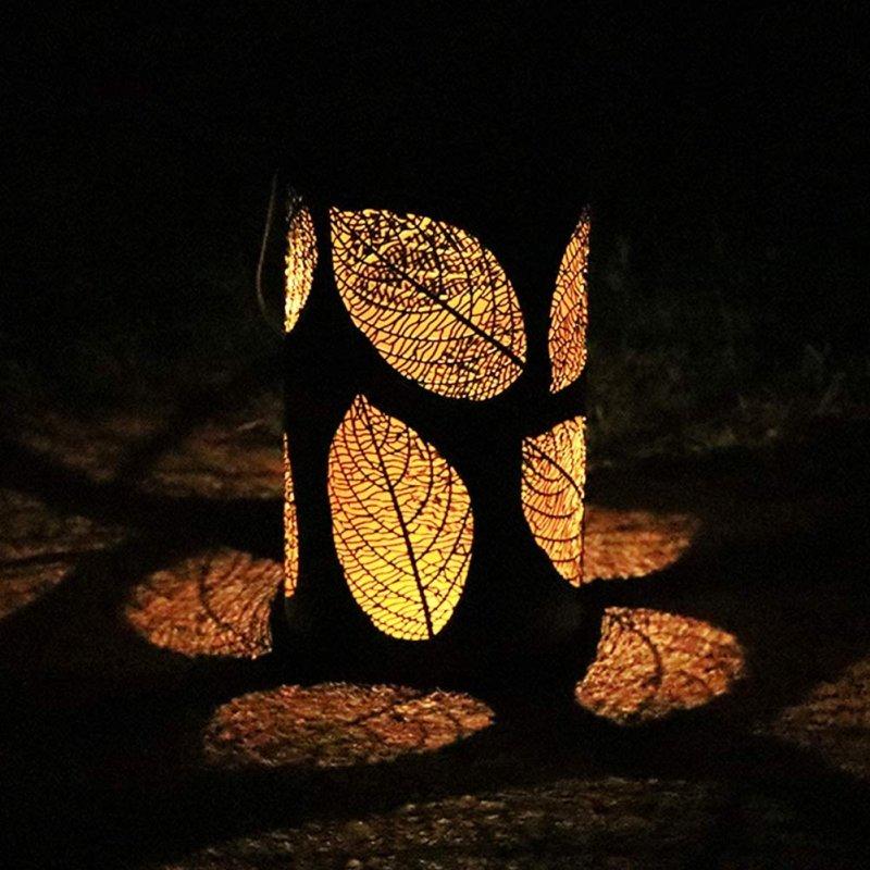 Solar Lights |   Wholesale Iron Solar Lamp Hollowed Out Leaf Shadow Lantern Hanging Lighting Outdoor Landscape Light warm light LED Lighting Solar Lights